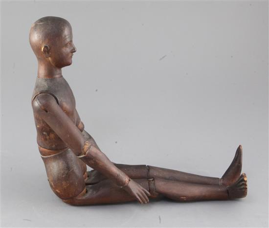 A late 19th / early 20th century carved wood artists lay figure, 19.25in.